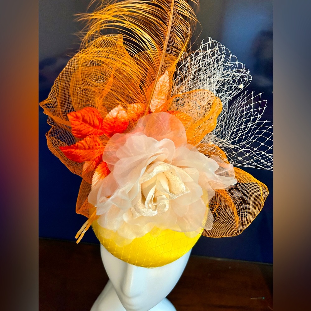 Yellow fascinator. Yellow and orange fascinator. Kentucky derby hat. Church hat